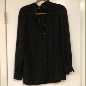 Sheer black top. New.  no tag . Never worn .